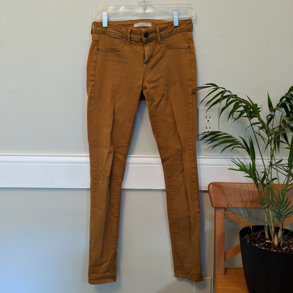 Ochre mid-rise skinny jeans